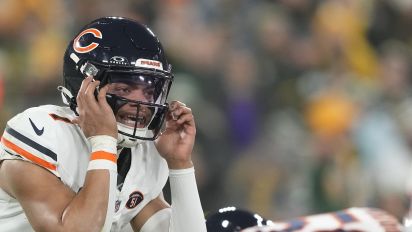 Getty Images - GREEN BAY, WISCONSIN - JANUARY 07: Justin Fields #1 of the Chicago Bears looks on in the first half against the Green Bay Packers at Lambeau Field on January 07, 2024 in Green Bay, Wisconsin. (Photo by Patrick McDermott/Getty Images)