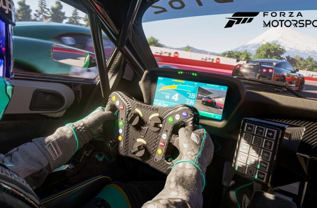 A racing driver wearing a helmet holds a steering wheel during a race in Forza Motorsport.