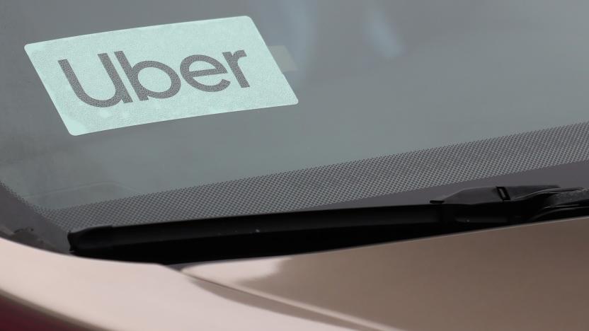 Uber sign is seen on a car in New York, U.S., April 12, 2019. REUTERS/Shannon Stapleton