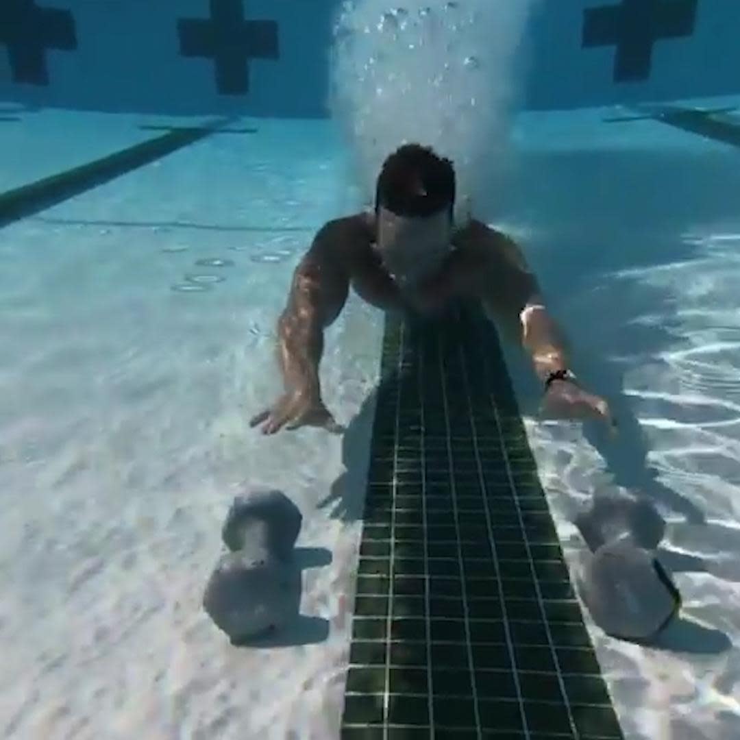 This Fitness Junkie Does Crazy Underwater Workouts Video