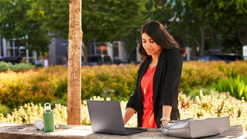 A woman using an Intel Evo branded notebook.