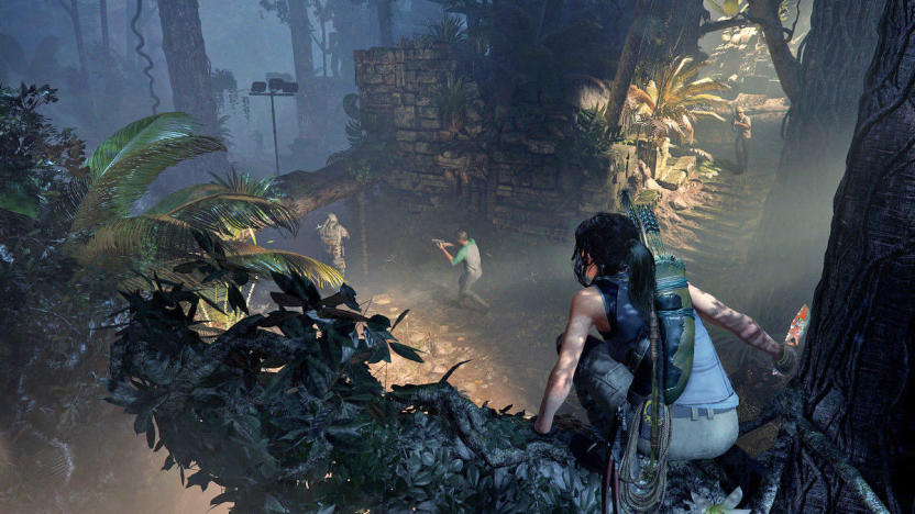Tomb Raider's Lara Croft sits on a tree branch spying on enemies below.