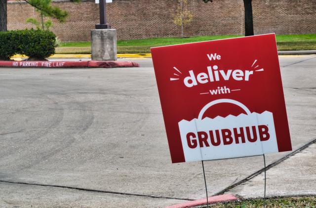 Humble, Texas/USA 01/01/2020: Grubhub sign posted in the ground near some local businesses in Humble, TX. Grubhub is an online fast food delivery service that is becoming increasingly popular in the US.