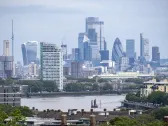 FTSE closes higher as pound soars and Wall Street holds gains