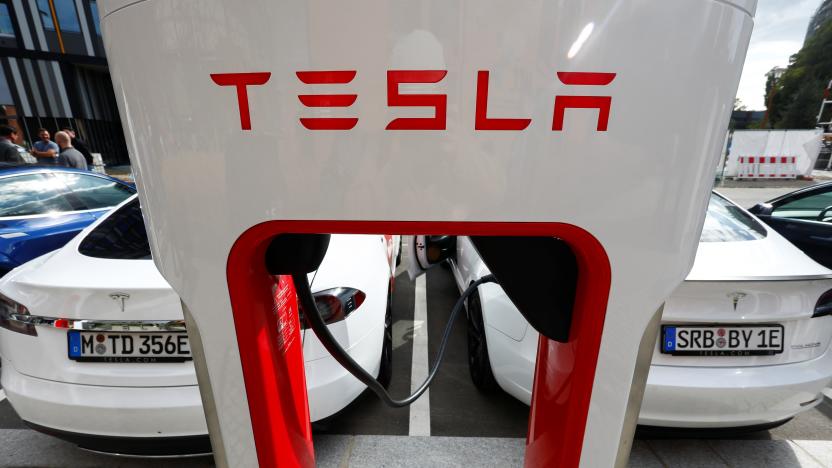 The company logo of Tesla cars is seen on the V3 supercharger equipment during the presentation of the new charge system in the EUREF campus in Berlin, Germany September 10, 2020. REUTERS/Michele Tantussi