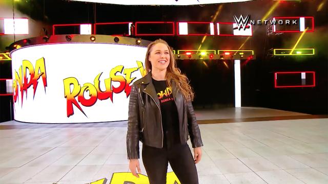 Ronda Rousey puts Triple H through table at WWE Elimination Chamber