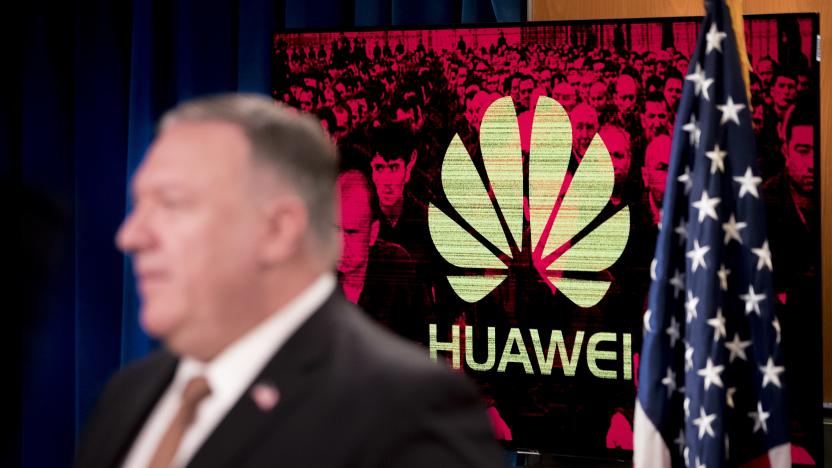 A monitor displays the logo for Huawei behind Secretary of State Mike Pompeo as he speaks during a news conference at the State Department in Washington,DC on July 15, 2020. - US Secretary of State Mike Pompeo said Wednesday he will visit Britain and Denmark next week, days after London pleased Washington with a ban on Chinese telecom giant Huawei. "I leave on Monday for a quick trip to the United Kingdom and Denmark, and I'm sure that the Chinese Communist Party and its threat to free peoples around the world will be high on top of that agenda," Pompeo told a news conference. (Photo by Andrew Harnik / POOL / AFP) (Photo by ANDREW HARNIK/POOL/AFP via Getty Images)