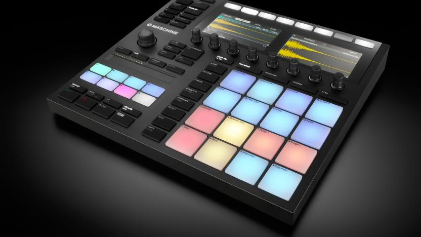 Product photo of the Native Instruments Maschine MK3 all-in-one production studio. The primarily black device has colorful drum pads, and various knobs and buttons on its complex but modern / attractive face.
