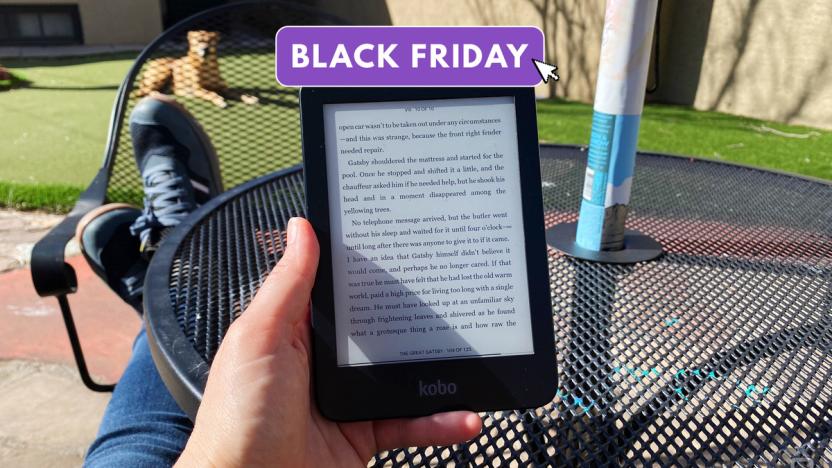 Photo of a person holding the Kobo Clara 2E on a sunny patio. A purple tag is overlaid that says "Black Friday."