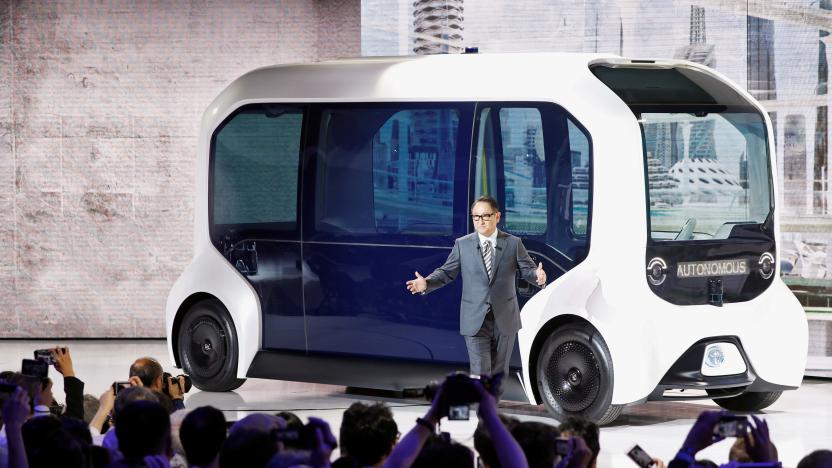 Toyota Motor Corporation President Akio Toyoda, shows the e-Palette autonomous concept vehicle   at the Tokyo Motor Show, in Tokyo, Japan October 23, 2019. REUTERS/Edgar Su