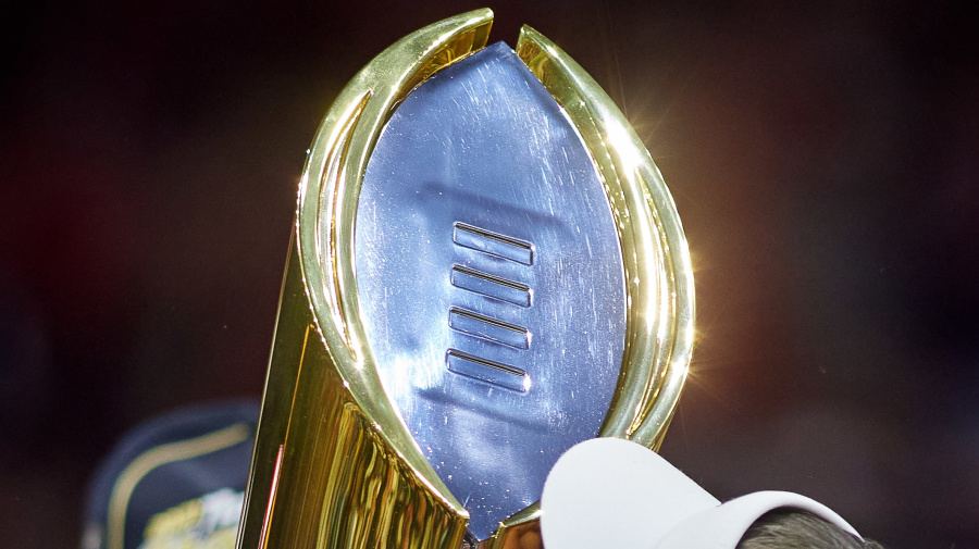 Getty Images - INDIANAPOLIS, IN - JANUARY 10: Georgia Bulldogs head coach Kirby Smart holds the national championship trophy after the Alabama Crimson Tide versus the Georgia Bulldogs in the College Football Playoff National Championship, on January 10, 2022, at Lucas Oil Stadium in Indianapolis, IN.(Photo by Robin Alam/Icon Sportswire via Getty Images)