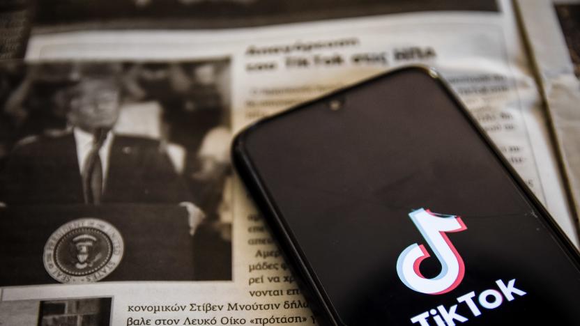 TikTok closeup logo displayed on a smartphone screen and the local newspaper of Chania, Crete Island, Greece on August 3, 2020. President of the USA Donald Trump is threatening and planning to ban the popular video sharing app TikTok from the US because of the security risk. (Photo Illustration by Nikolas Kokovlis/NurPhoto via Getty Images)