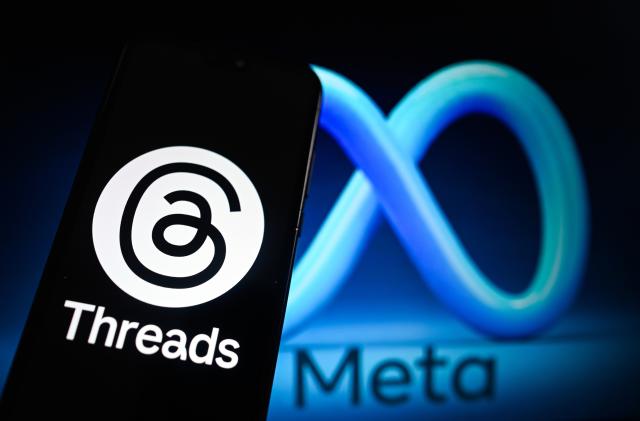 POLAND - 2024/04/16: In this photo illustration, a Threads logo is displayed on a smartphone with a META symbol in the background. (Photo Illustration by Omar Marques/SOPA Images/LightRocket via Getty Images)