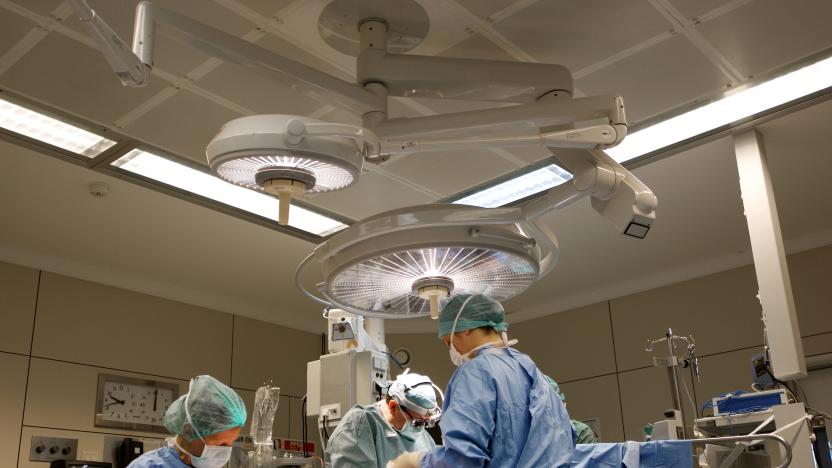 Surgeons team operating heart 