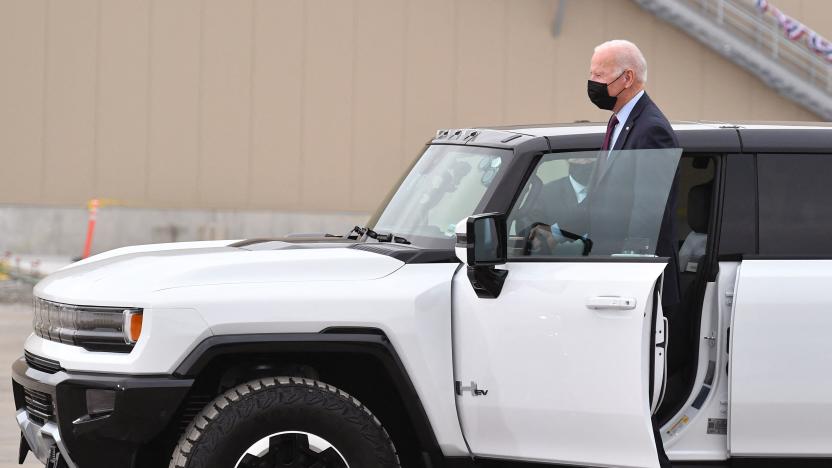 US President Joe Biden test drives a GMC Hummer EV as he tours the General Motors Factory ZERO electric vehicle assembly plant in Detroit, Michigan on November 17, 2021. (Photo by MANDEL NGAN / AFP) (Photo by MANDEL NGAN/AFP via Getty Images)