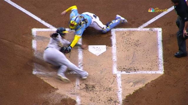 Noda scores with incredible slide on Laureano's two-run triple