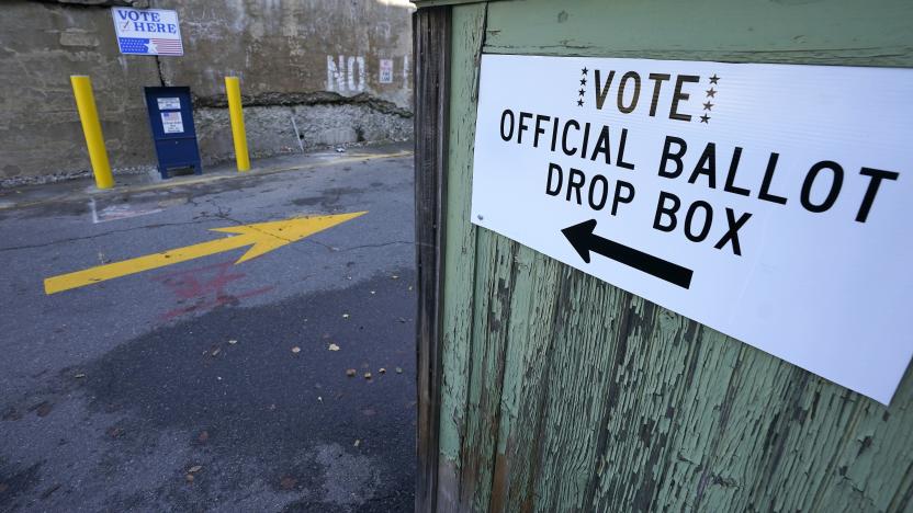 A ballot drop box is stationed outside Haverhill City Hall during early voting, Thursday, Oct. 22, 2020, in Haverhill, Mass. (AP Photo/Elise Amendola)