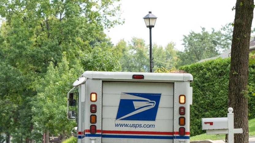 Berks County, Pennsylvania, USA-August 15, 2020: USPS truck delivering mail on suburban street in Pennsylvania.