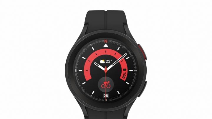 A black watch with a red and white interface on it. 