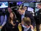 Stocks and bonds wobble as global economy throws off mixed signals