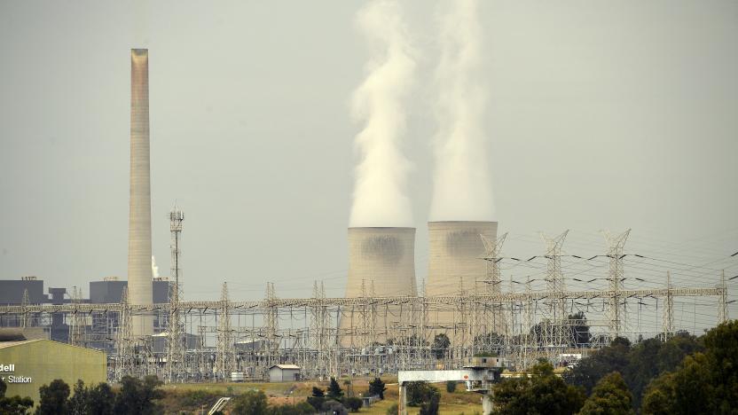 This picture taken on November 4, 2021 shows steam rising from cooling towers of the power generating plants in the town of Singleton, some 70km (43 miles) from Newcastle, the world's largest coal exporting port. - Australia's conservative leaders have defied calls for urgent climate action, boasting they will sell coal for as long as anyone is buying, but in the country's carbon heartland, locals are already preparing for life beyond fossil fuels. - TO GO WITH UN-climate-COP26-Australia-coal,FOCUS by Andrew LEESON (Photo by Saeed KHAN / AFP) / TO GO WITH UN-climate-COP26-Australia-coal,FOCUS by Andrew LEESON (Photo by SAEED KHAN/AFP via Getty Images)