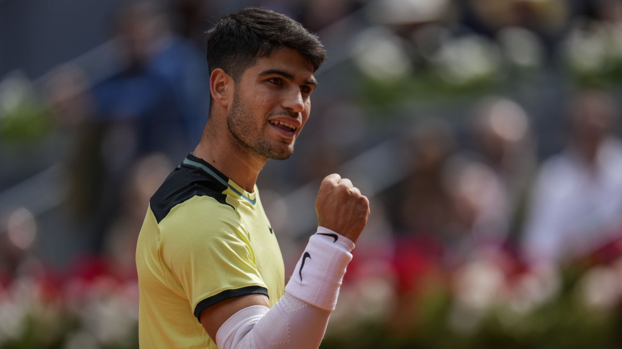 Associated Press - Carlos Alcaraz, of Spain, celebrates against Thiago Seyboth Wild, of Brazil, during the Mutua Madrid Open tennis tournament in Madrid, Sunday, April 28, 2024. (AP Photo/Manu Fernandez)