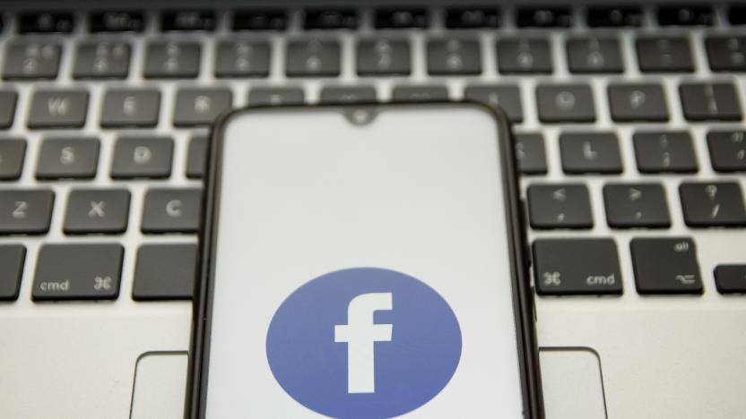 In this photo illustration a Facebook logo seen displayed on a smartphone screen with a computer keyword in the background in Athens, Greece on January 18, 2022. ( (Photo illustration by Nikolas Kokovlis/NurPhoto via Getty Images)