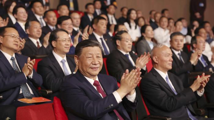 Chinese President Xi Jinping applauds as he attends a concert marking the 75th anniversary of the establishment of diplomatic relations between Russia and China and opening of China-Russia Years of Culture at the National Centre for the Performing Arts in Beijing, China, on Thursday, May 16, 2024. (Alexander Ryumin, Sputnik, Kremlin Pool Photo via AP)