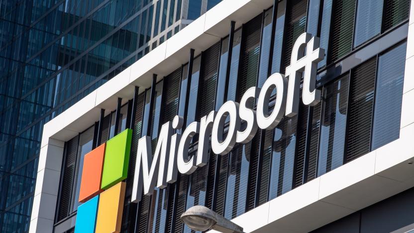 26 March 2021, Bavaria, Munich: The Microsoft logo hangs on the facade of an office building in Parkstadt Schwabing, in the north of the Bavarian capital. Photo: Peter Kneffel/dpa (Photo by Peter Kneffel/picture alliance via Getty Images)