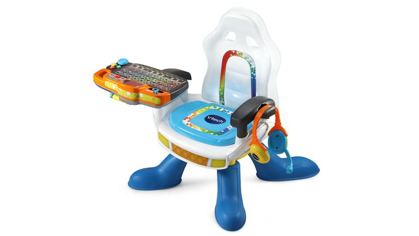 A baby-sized gaming chair with a keyboard and headset