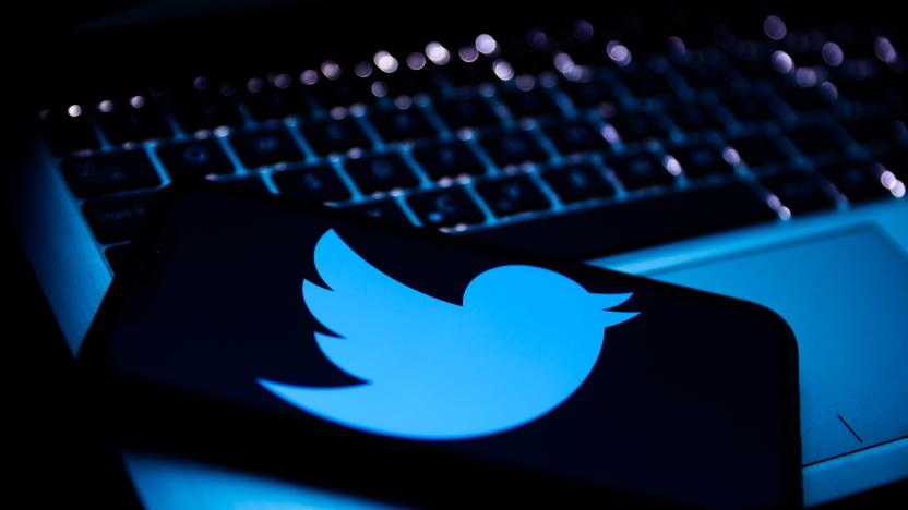 Twitter logo displayed on a phone screen and a laptop keyboard are seen in this illustration photo taken in Krakow, Poland on April 9, 2022. (Photo by Jakub Porzycki/NurPhoto via Getty Images)