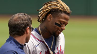 Associated Press - Atlanta Braves' Ronald Acuña Jr., right, walks off the field with a trainer after being injured while running the bases during the first inning of a baseball game against the Pittsburgh Pirates in Pittsburgh, Sunday, May 26, 2024. (AP Photo/Gene J. Puskar)