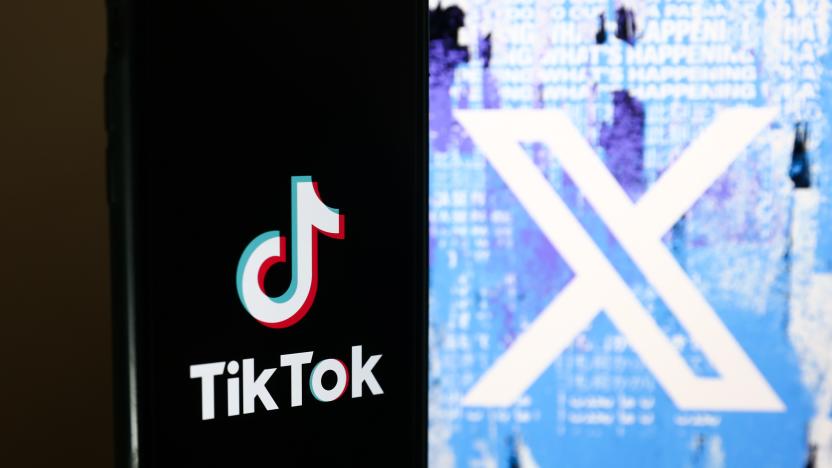 TikTok logo displayed on a phone screen and Twitter X logo on website displayed on a laptop screen are seen in this illustration photo taken in Warsaw, Poland on July 26, 2023. (Photo by Jakub Porzycki/NurPhoto via Getty Images)