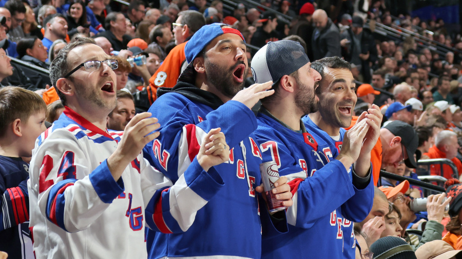 Getty Images - PHILADELPHIA, PENNSYLVANIA - FEBRUARY 24:  Fans of the New York Rangers cheer during an NHL game against the Philadelphia Flyers at the Wells Fargo Center on February 24, 2024 in Philadelphia, Pennsylvania.  (Photo by Len Redkoles/NHLI via Getty Images)