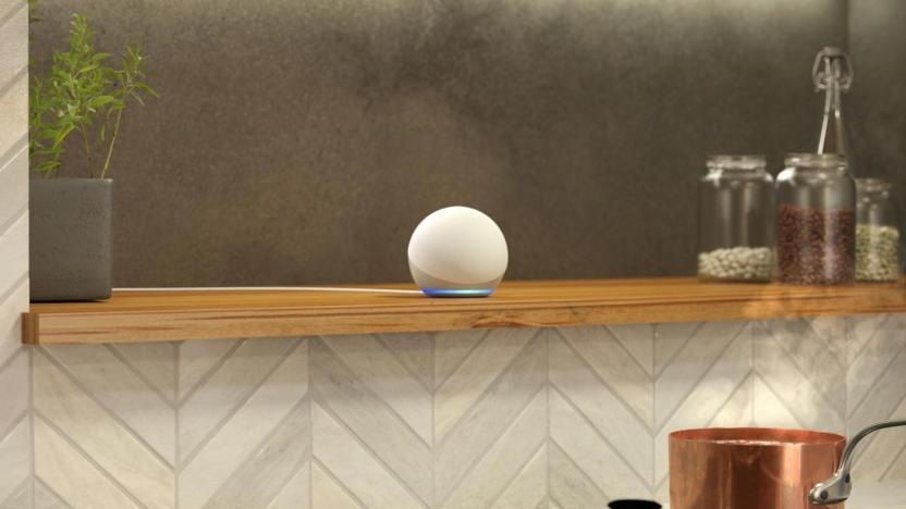 Amazon's Echo Dot smart speaker on a kitchen shelf.