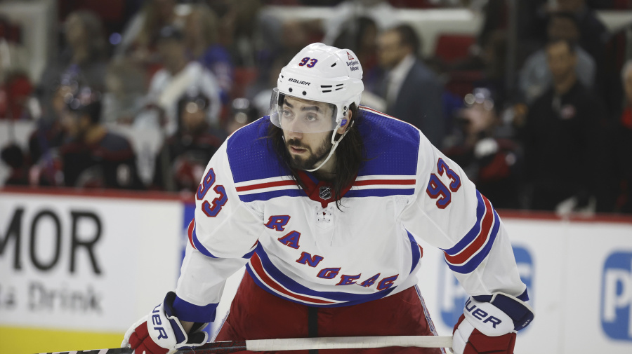 Associated Press - New York Rangers' Mika Zibanejad (93) watches the puck against the Carolina Hurricanes during the third period in Game 4 of an NHL hockey Stanley Cup second-round playoff series in Raleigh, N.C., Saturday, May 11, 2024. (AP Photo/Karl B DeBlaker)