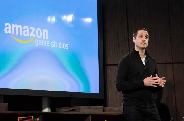 NEW YORK, NY - APRIL 02:  Amazon's vice president of games, Mike Frazzini, talks about the gaming components of the Amazon Fire TV, a new device that allows users to stream video, music, photos, games and more through their television, on April 2, 2014 in New York City. The unit goes on sale today and costs $99.  (Photo by Andrew Burton/Getty Images)