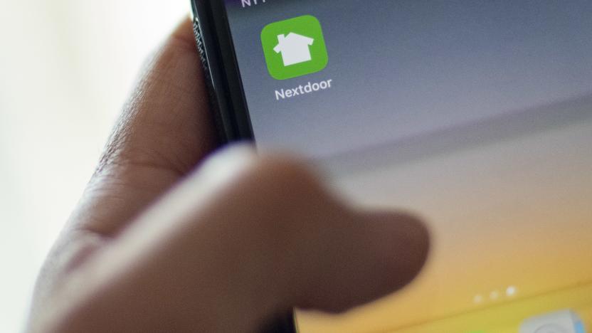 Nextdoor, the hyper local social network, is seen on a smartphone screen in Washington, DC, on March 27, 2020. - There are offers to pick up groceries or medicine for neighbors, to share supplies, or walk people's dogs. And exchange information on where to find scarce items like toilet paper.  For people forced to stay home to ride out the coronavirus pandemic, Nextdoor, the hyperlocal social network, has found itself playing an increasingly important role. (Photo by Eric BARADAT / AFP) (Photo by ERIC BARADAT/AFP via Getty Images)