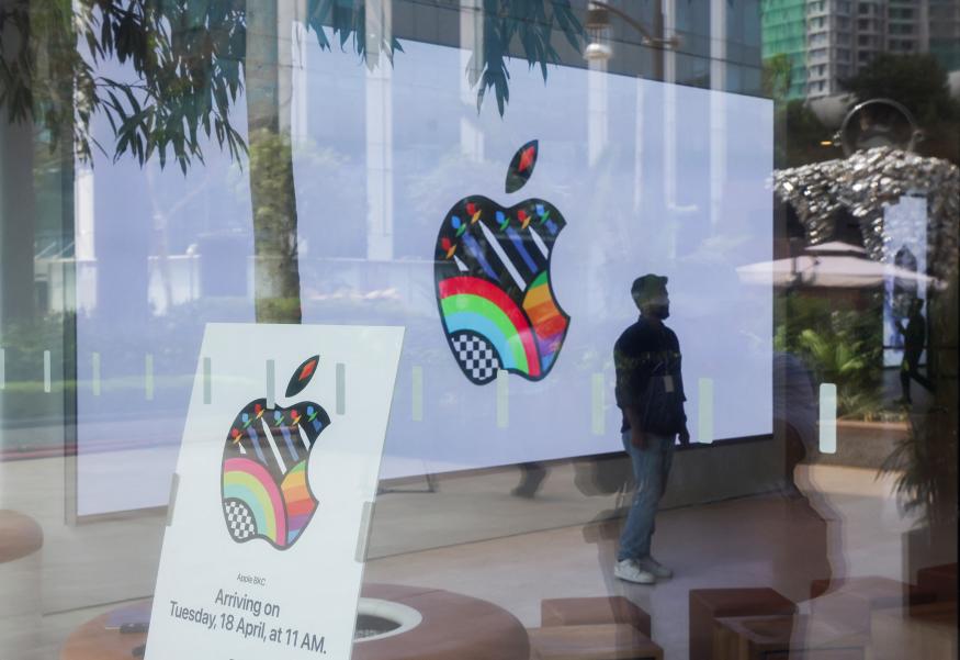 A man stands inside India's first Apple retail store during a media preview, a day ahead of its launch in Mumbai, India, April 17, 2023. REUTERS/Francis Mascarenhas