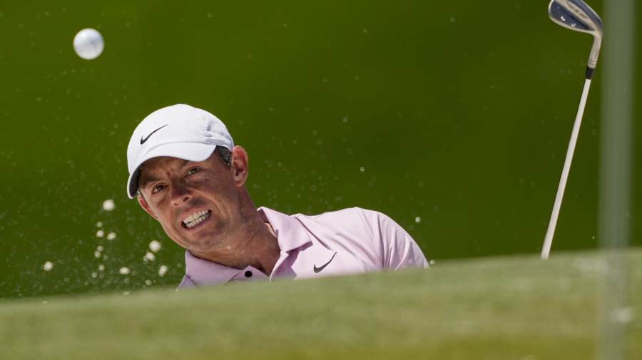 Associated Press - Rory McIlroy, of Northern Ireland, watches his bunker shot on the fourth hole during the final round of the Wells Fargo Championship golf tournament at the Quail Hollow Club Sunday, May 12, 2024, in Charlotte, N.C. (AP Photo/Chris Carlson)