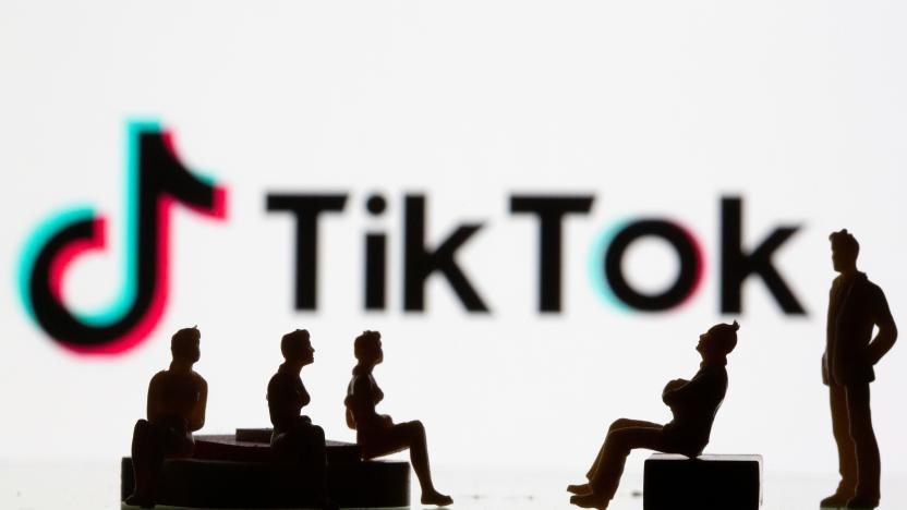 Small toy figures are seen in front of a Tiktok logo in this illustration taken, September 9, 2020. REUTERS/Dado Ruvic/Illustration