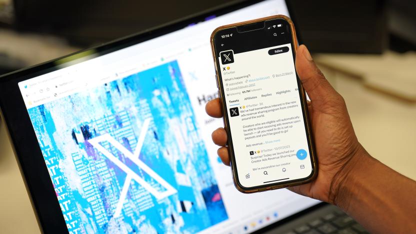 A person looks at the new logo for Twitter on an Apple iPhone in an office in London. Twitter has replaced the social media platform's famous bird logo with an X as part of owner Elon Musk's plans to create an "everything app". Picture date: Monday July 24, 2023. (Photo by Jonathan Brady/PA Images via Getty Images)