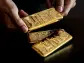 Gold Retreats From Record as Traders Weigh Fedspeak, Await Data