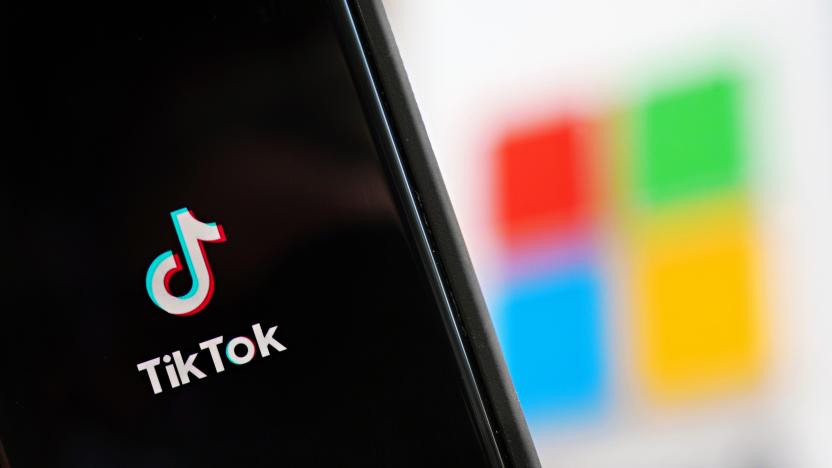 NEW YORK, NEW YORK - AUGUST 03: In this photo illustration, a mobile phone featuring the TikTok app is displayed next to the Microsoft logo on August 03, 2020 in New York City. Under threat of a U.S. ban on the popular social media app, it has been reported that Microsoft is considering taking over from Chinese firm ByteDance. (Photo Illustration by Cindy Ord/Getty Images)