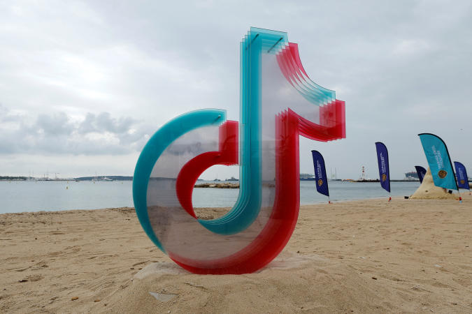 The TikTok logo is seen on the beach during the Cannes Lions International Festival of Creativity in Cannes, France, June 22, 2022.    REUTERS/Eric Gaillard