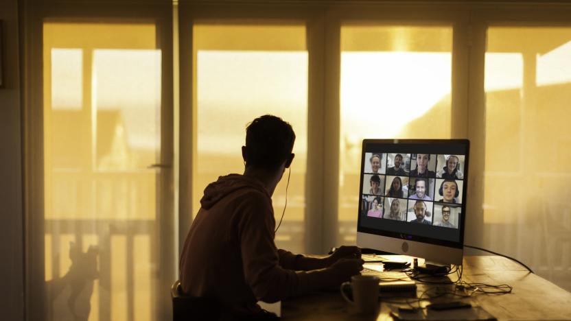 Young man distracted while on  video call from his home during lockdown