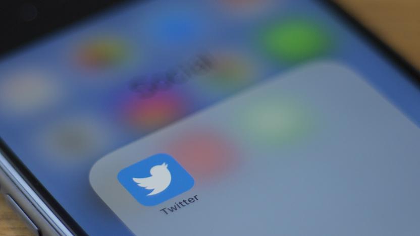 The Twitter logo is seen on a phone in this photo illustration in Washington, DC, on July 10, 2019. - Twitter is moving to filter out inappropriate content based on religion as part of its effort to curb hate speech. In a policy update on July 9, 2019, Twitter said it would take down "dehumanizing language" that targets specific religious groups.Examples shown by Twitter that would be removed would be description of a members of a religion as "disgusting" or "filthy animals." (Photo by Alastair Pike / AFP)        (Photo credit should read ALASTAIR PIKE/AFP/Getty Images)