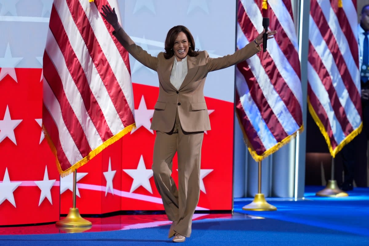 Kamala Harris makes surprise appearance at first night of DNC: ‘We are moving forward’