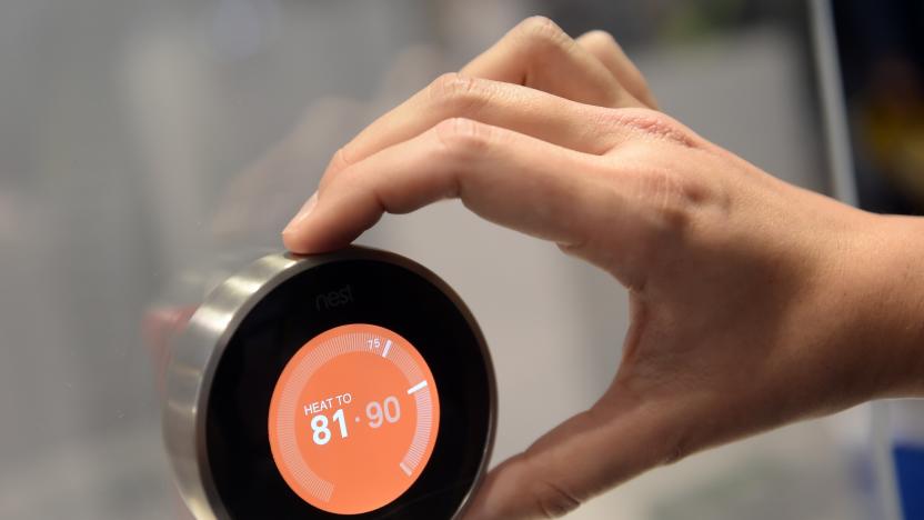 A thermostat from 'Nest' at CES (Consumer Electronics Show) in Las Vegas, Nevada, USA, 08 January 2015. The trade show takes place from 06 to 09 January 2015. Photo: BRITTA PEDERSEN/dpa | usage worldwide   (Photo by Britta Pedersen/picture alliance via Getty Images)