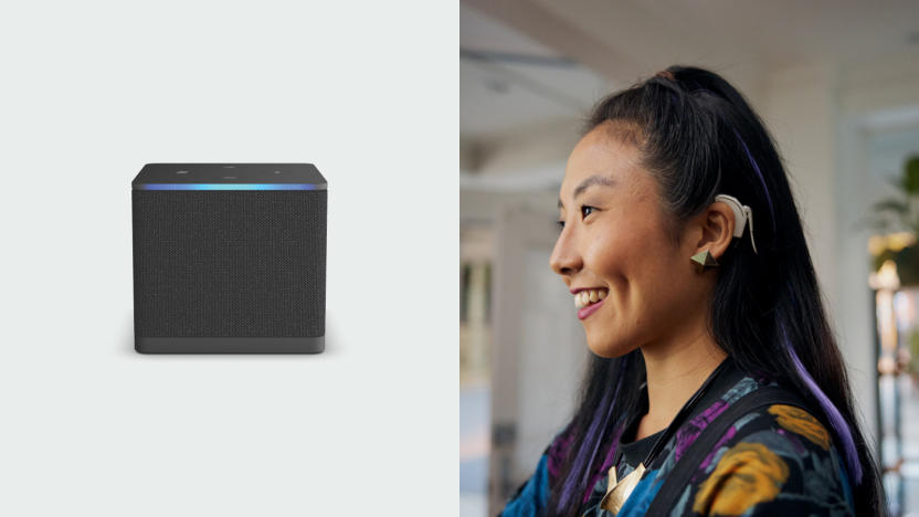 An image split in two down the middle. On the left half: a Fire TV Cube streaming box. On the right: a woman wearing an assistive hearing device, smiling in a living room.